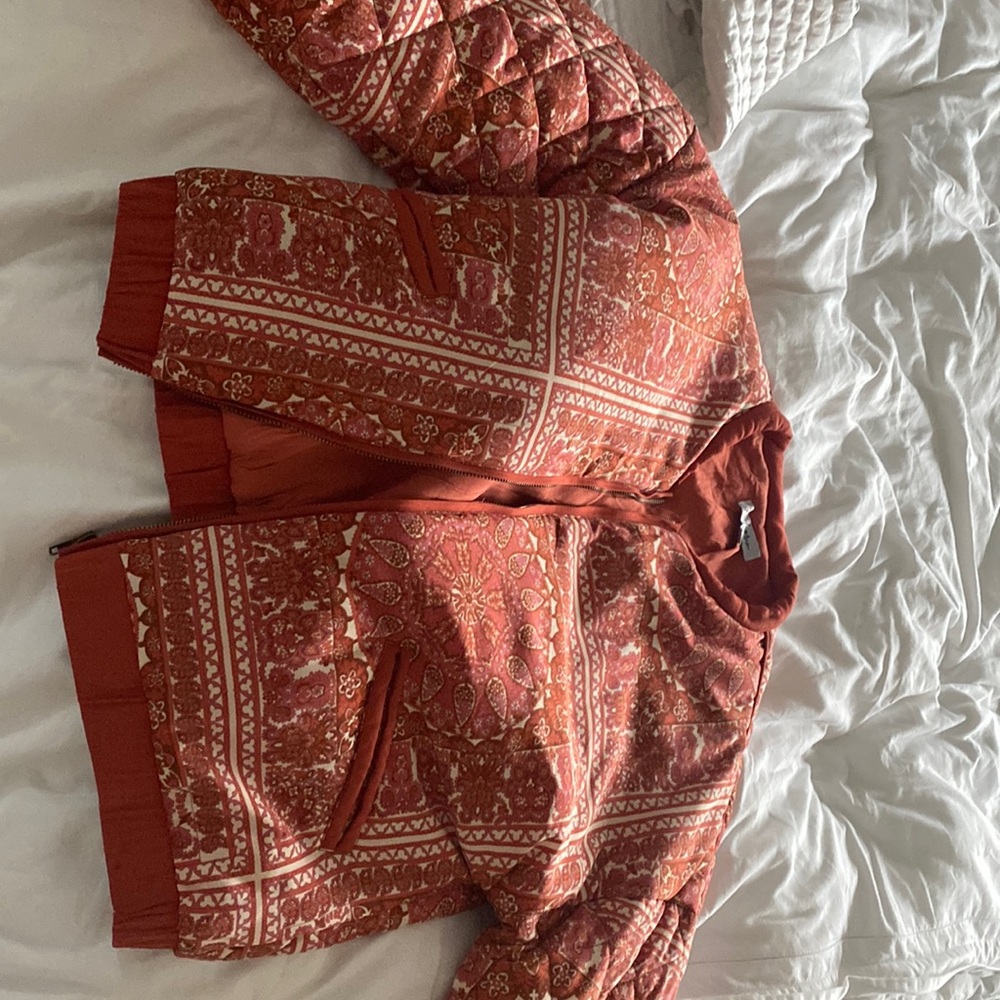 Beautiful orange patterned quilted jacket.